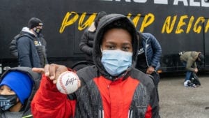 Kid Shows Off Signed Baseball